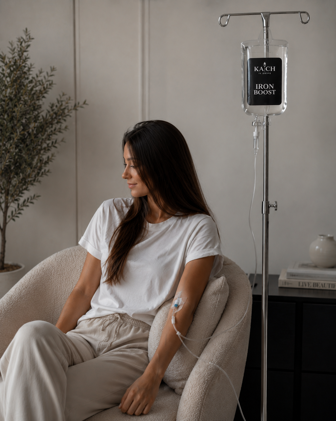 Patient relaxing at home during a KACH Iron Boost IV drip